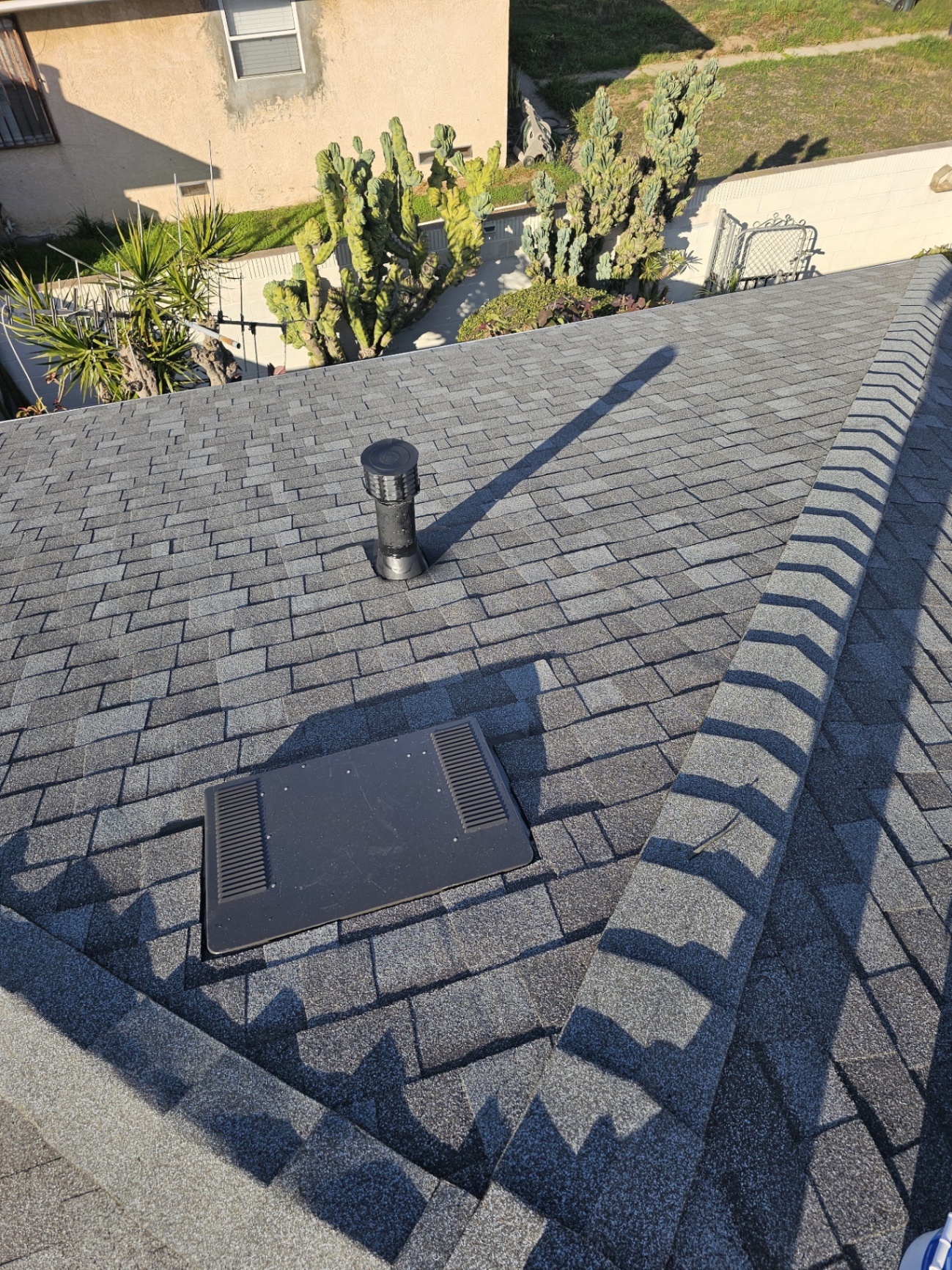 New shingle roof in San Diego with turbine-free static vent and attic vent