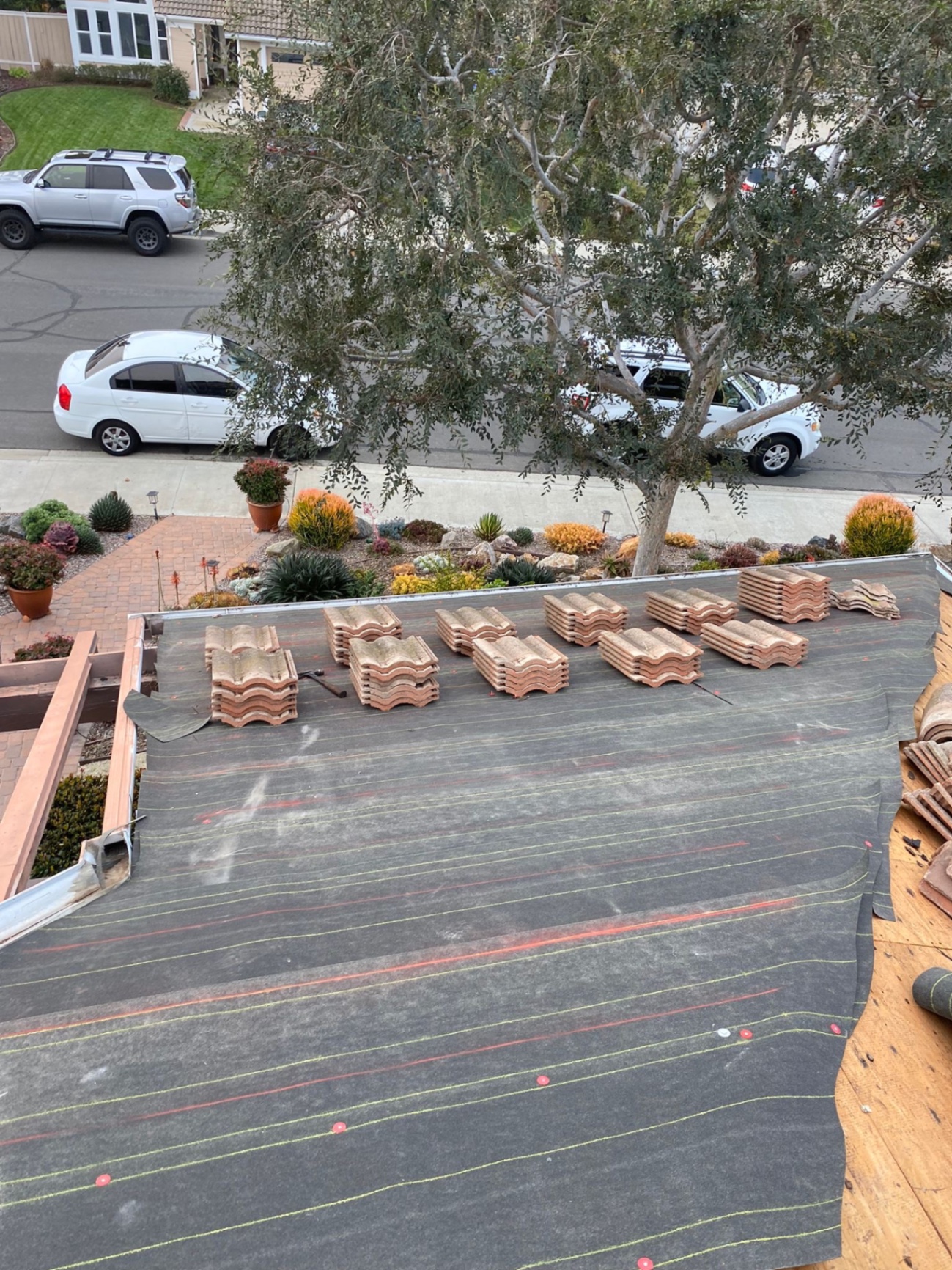 New underlayment chalked and tile loaded on a San Diego County tile roof