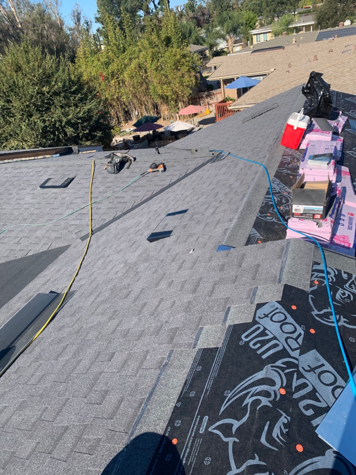 Owens Corning Duration Cool shingle bundles staged on a San Diego roof during a re-roof