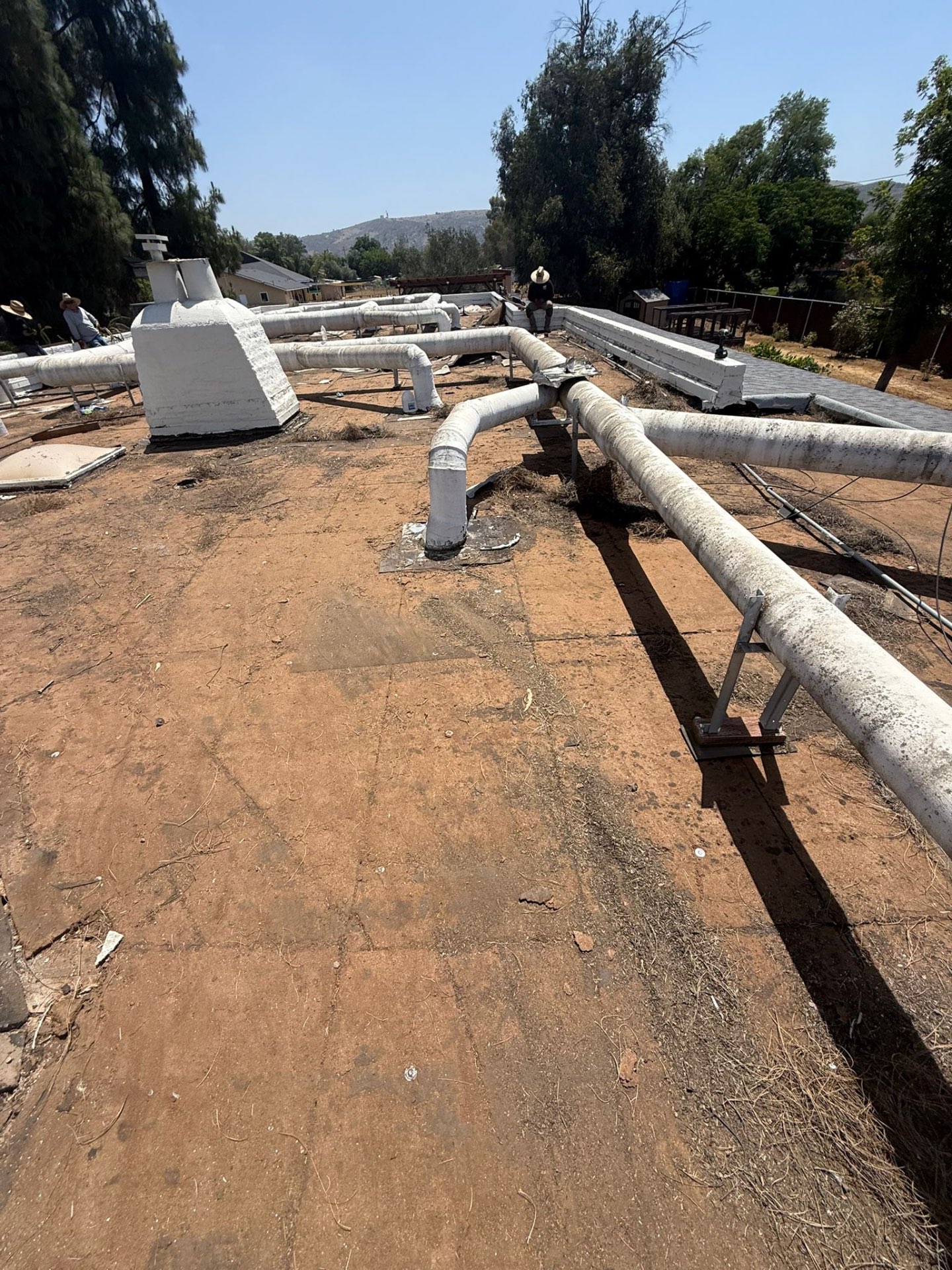 Rooftop HVAC ducts and curbs on a Kearny Mesa commercial flat roof