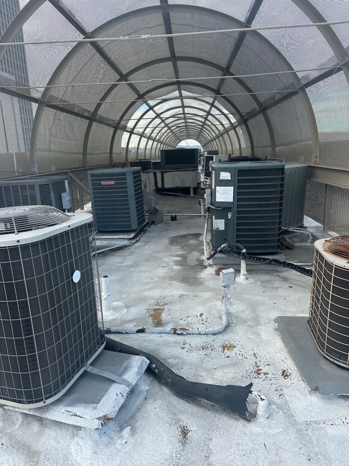 HVAC units and curbs inspected on a downtown San Diego commercial roof