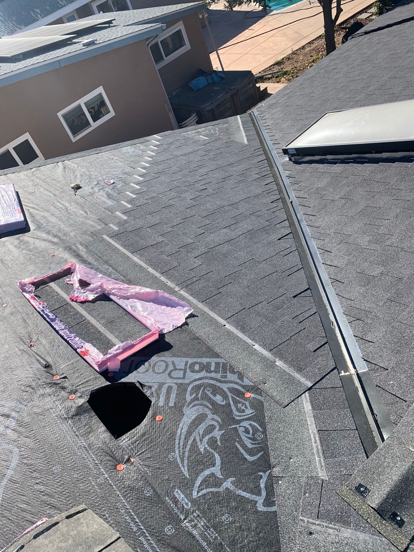 New valley metal, drip edge, and starter course on a San Diego shingle roof replacement