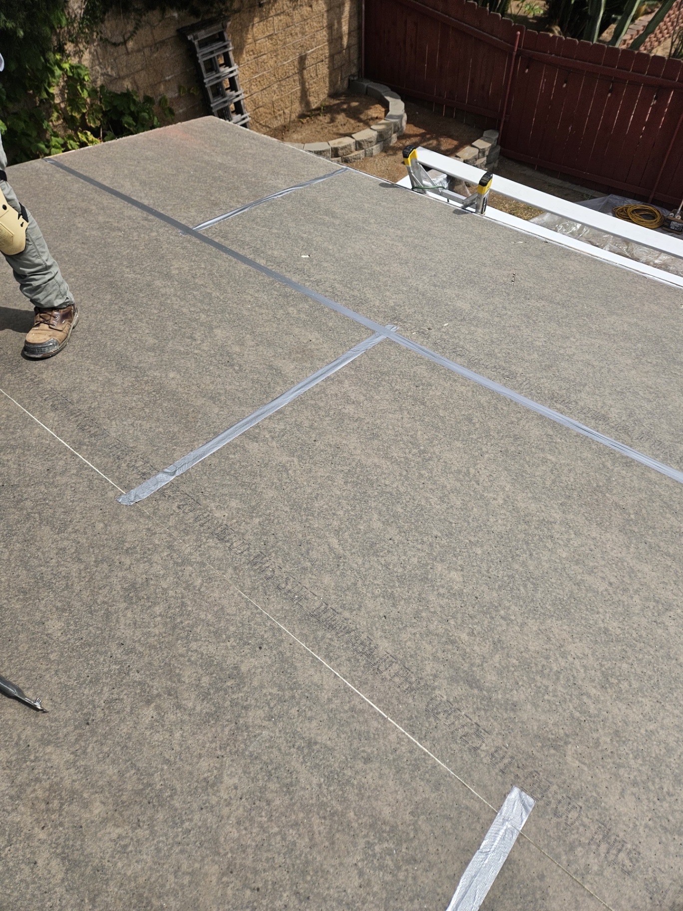 Sealed polyiso roof insulation installation for a home without an attic
